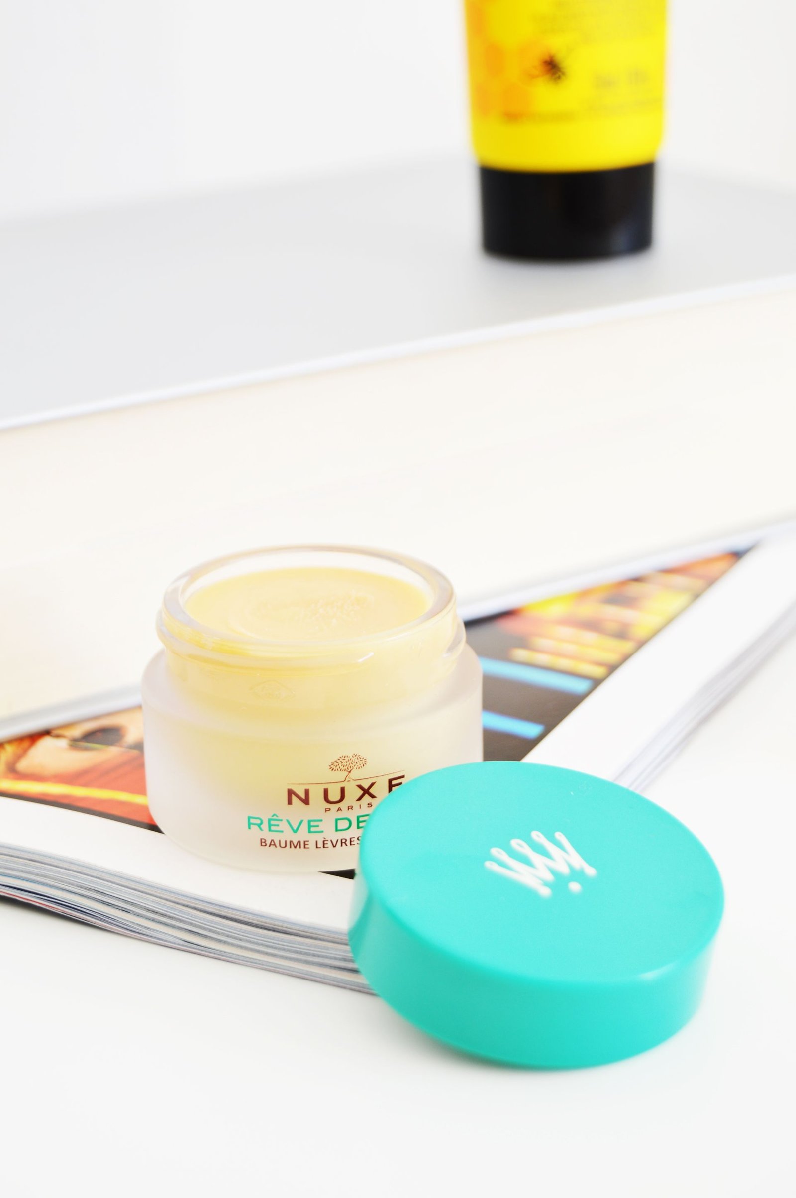 There are some essentials that you should have on your bedside table. Hand cream, lip balm and facial mist are some of these bedside beauty essentials. Nuxe Reve de Miel® - Ultra Nourishing Lip Balm is one heavy duty lip balm that you can add to your bedside beauty essentials.